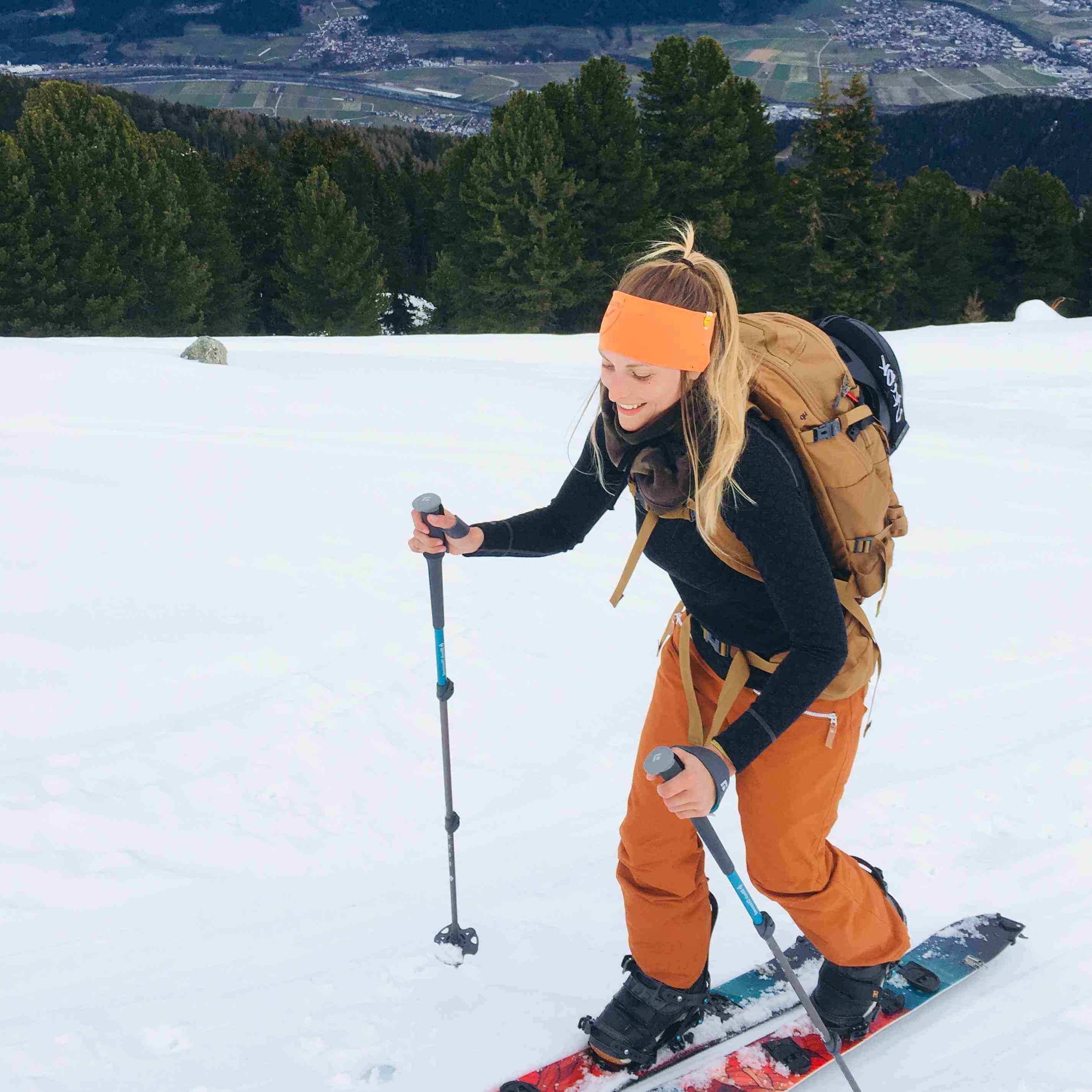 happy-woman-on-her-skis-in-winter